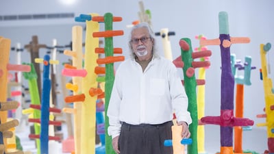 Emirati artist Mohamed Ahmed Ibrahim with his installation Between Sunrise and Sunset. Ruel Pableo for The National