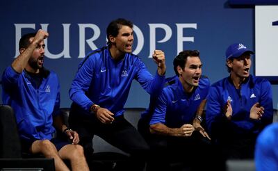 Rafael Nadal and Roger Federer were on the same side for a change. David W Cerny / Reuters