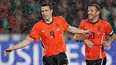 Arsenal's Robin van Persie, centre, comes into the World Cup fresher than most players after an injury-plagued season for the English Premier League club.