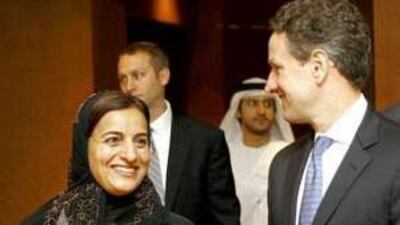Sheikha Lubna Al Qasimi, Minister of Foreign Trade and Tim Geithner ,right, Secretary of the US Treasury, meet for a breakfast event at the Emirates Palace.