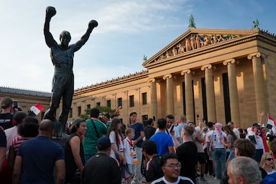 Hundreds of Iraq fans gather outside the Rocky statue in Philadelphia. Joshua Longmore / The National