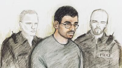 Court artist sketch by Elizabeth Cook of Hashem Abedi in the dock at Westminster Magistrates' Court where he is appearing following his extradition from Libya, in London, Thursday July 18, 2019. The brother of the suicide bomber who killed almost two dozen people at an Ariana Grande concert in Manchester appeared in court Thursday to face 22 charges of murder. (Elizabeth Cook/PA via AP)