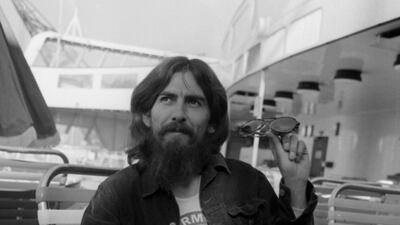 George Harrison after boarding in New York following three months of recording in the US, September 1971. Getty Images