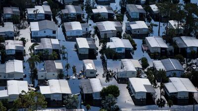A mobile home park in Bonita Springs in Florida is flooded after Hurricane Irma sweeps through the state. Nicole Raucheisen / Naples Daily News via AP