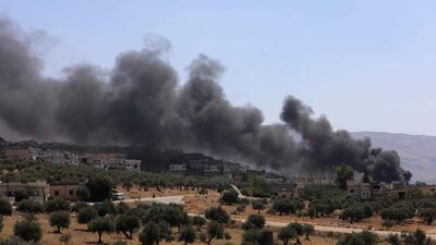 Russian airstrikes reportedly hit the rebel-hold town of Muhambal, about 30 kilometres southwest of Idlib. Omar Haj Kadour / AFP