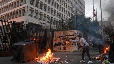 An anti-government protester in front of the Lebanese Central Bank, at Hamra street, Beirut. EPA