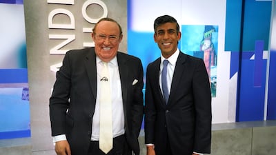 Veteran British journalist Andrew Neil stands with Rishi Sunak before he appears on 'The Andrew Neil Show'. PA
