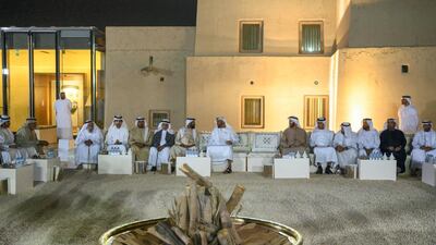 Sheikh Mohamed bin Zayed speaks with Sheikh Tahnoon bin Mohamed Al Nahyan, Ruler's Representative in Al Ain Region, eighth left, during a barza at Qasr Al Muwaiji. He is seen with Abdullah Saleh bin Badowah, Sheikh Khaled bin Zayed Al Nahyan, Dr Sheikh Mansour bin Tahnoon bin Mohamed Al Nahyan, 10th left; and Sheikh Hazza bin Tahnoon Al Nahyan.