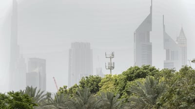 The Dubai skyline with overcast and hazy conditions. Antonie Robertson / The National