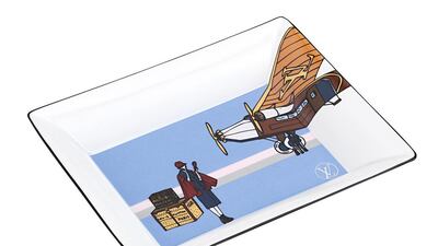 Stylish storage: a ceramic valet tray featuring world expeditions. Courtesy Louis Vuitton