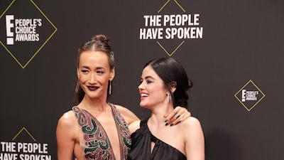 Maggie Q in Sebastian Gunawan and Lucy Hale in Cong Tri at the 2019 People's Choice Awards in Santa Monica, California, on Sunday, November 10, 2019. Reuters