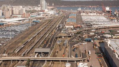Lorries and cargo vessels at the Port of Durban in South Africa that was forced to close in July because of riots. AFP