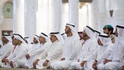 Sheikh Mohammed bin Zayed, Crown Prince of Abu Dhabi and Deputy Supreme Commander of the Armed Forces, fourth right, and King Hamad bin Isa Al Khalifa of Bahrain, fifth right, attend Friday prayers and absentee funeral prayer at the Sheikh Zayed Grand Mosque. They were joined by Sheikh Saif bin Zayed, Deputy Prime Minister and Minister of Interior, right, Sheikh Suroor bin Mohammed, third right, Sheikh Hazza bin Zayed, National Security Advisor and Vice Chairman of the Abu Dhabi Executive Council, sixth right, Sheikh Mansour bin Zayed, Deputy Prime Minister and Minister of Presidential Affairs, seventh right, and Sheikh Hamed bin Zayed, Chairman of Crown Prince Court - Abu Dhabi and Managing Director of the Abu Dhabi Investment Authority, left. Ryan Carter / Crown Prince Court - Abu Dhabi
