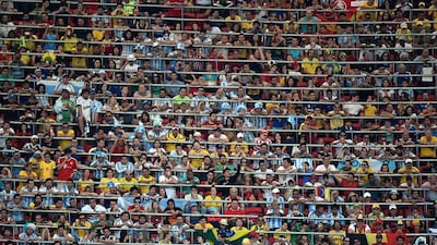 Football fans watch during the second half of the 2014 World Cup quarter-final football match between Argentina and Belgium at the Estadio Nacional Mane Garrincha in Brasilia, Brazil on Saturday. Christophe Simon / AFP