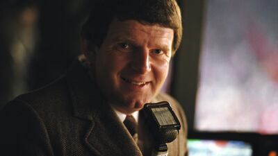 Motson on the mic for an FA Cup tie between Manchester United and West Ham in 1985. Getty Images
