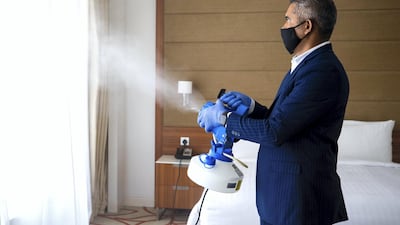 Room sanitation procedures conducted in the rooms at Marriot Hotel Downtown, Abu Dhabi. Victor Besa / The National