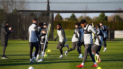 Liverpool players during a training session at the AXA Training Centre, Liverpool. PA