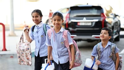 Pupils return to the British School Al Khubairat in Abu Dhabi, after a spell of remote learning. Chris Whiteoak / The National
