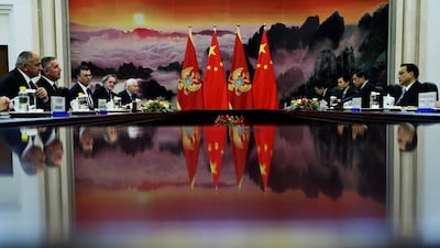 China’s premier Li Keqiang, right, and Montenegrin prime minister Milo Djukanovic, second left, are seen during their meeting, on the sideline of the 4th Meeting of Heads of Government of China and Central and Eastern European Countries, at the Great Hall of the People in Beijing. Kim Kyung-hoon / EPA