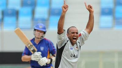 A Sri Lankan cricket fan shows off his prized possession, a ticket for a World Cup match, in Colombo.