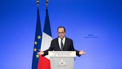 French president Francois Hollande delivers his speech at the opening of an international meeting in a bid to revive the Israeli-Palestinian peace process in Paris, France. Kamil Zihnioglu / AP Photo