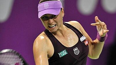 Vera Zvonareva, of Russia, hits a return to Victoria Azarenka, of Belarus, during a 7-6, 6-4 victory on the second day of competition in Doha.