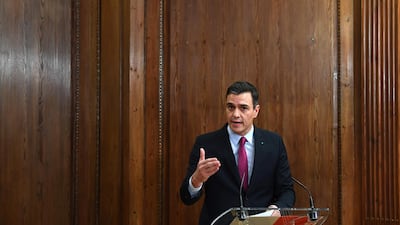 Spanish caretaker prime minister and candidate for re-election, socialist Pedro Sanchez deliver a speech after signing a coalition government agreement with far left Podemos party at the Congress in Madrid on December 30, 2019 AFP
