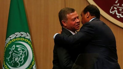 Jordan’s King Abdullah II greets Sudan’s president Omar Al Bashir, right. Mohammad Hamed / Reuters
