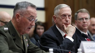 US chairman of the joint chiefs of staff General Joseph Dunford, left, speaks as defence secretary Jim Mattis, and defence under secretary David Norquist listen during a House armed services committee hearing on the 2018 defence budget, on Capitol Hill, Washington, on June 12, 2017. Alex Brandon / AP Photo