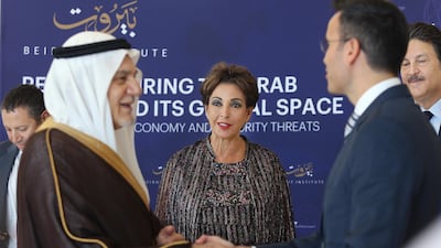 Raghida Dergham (centre), the founder and executive chairwoman of the Beirut Institute, at a previous conference with Prince Turki Al Faisal. Delores Johnson / The National