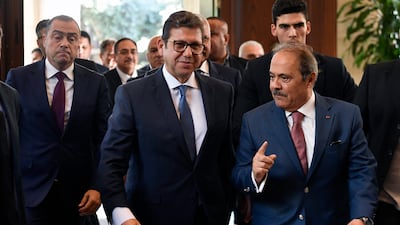 Egypt's intelligence chief Hassan Rashad, centre, arrives to meet Lebanon's parliament Speaker Nabih Berri. EPA