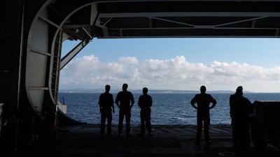 French Navy officers on the Charles de Gaulle aircraft carrier off the coast of Corsica. AFP