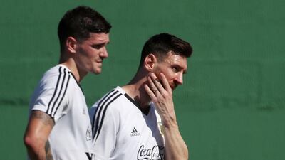 Argentina's Lionel Messi, right, and Rodrigo De Paul during training. Reuters