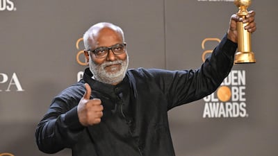 Indian film composer M M Keeravani with his Golden Globe award for Best Song - Motion Picture, for Naatu Naatu from RRR. AFP