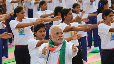 Indian prime minster Narendra Modi performs yoga to mark the first international Day of Yoga at Rajpath in New Delhi. Harish Tyagi / EPA