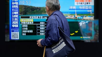 Japanese news reports the tsunami alert for the Okinawa region. The warning has since been cancelled. AP