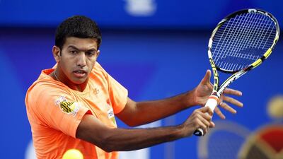 Rohan Bopanna of the Indian Aces in action against James Blake of the Philippine Mavericks. Ali Haider / EPA