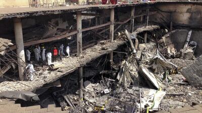 A reader says the world needs to play a more proactive role to eradicate terrorism. Jason Straziuso / AP Photo