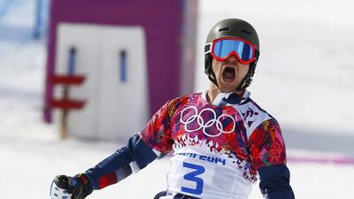 Russia’s Vic Wild won the men’s parallel snowboard finals on Saturday for his second gold medal. Mike Blake / Reuters