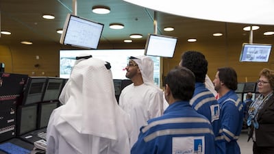 Sheikh Mohammed bin Zayed, centre, Crown Prince of Abu Dhabi and Deputy Supreme Commander of the UAE Armed Forces, tours the main building of the Al Hosn gas facility. Ryan Carter / Crown Prince Court - Abu Dhabi