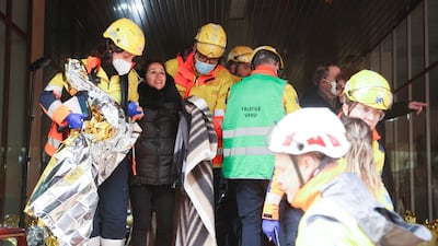 A wounded person is helped by emergency personnel in Montcada i Reixac, near Barcelona. Reuters