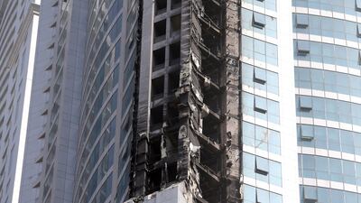 Fire ripped through The Torch, one of the tallest towers in Dubai, on August 4. This is the second blaze to hit the skyscraper after a previous incident in 2015 caused extensive damage to its luxury flats. Karim Sahib / AFP