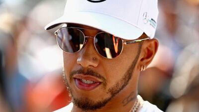 Lewis Hamilton talks to the media in the paddock ahead of the Australian Grand Prix at Albert Park on March 23, 2017 in Melbourne, Australia. Clive Mason / Getty Images