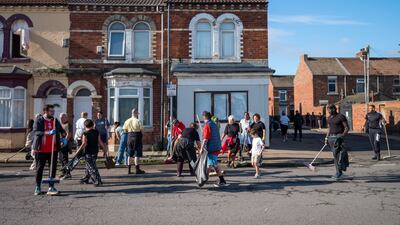 Residents of Middlesbrough, north-east England, help clean up the streets after far-right activists rioted and destroyed property. Getty images
