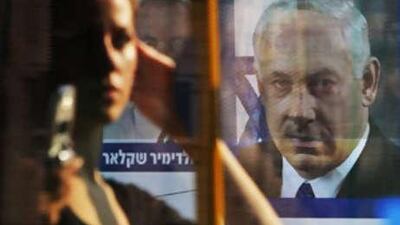 A picture of Likud Party leader and the former Israeli prime minister Benjamin Netanyahu is seen on a bus in Jerusalem.