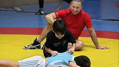 Georges St Pierre, in red, could have done anything he wanted but he chose to be a mixed martial artist because it is his passion. "I do it from the heart, not for fame and money," the Canadian says.