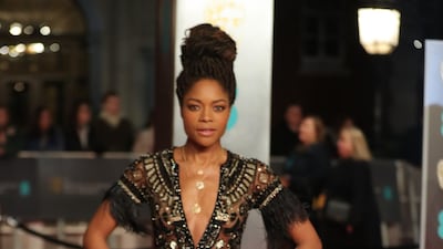 We love that Naomie Harris chose to wear a sleek cigarette pant under this embellished Zuhair Murad dress. Daniel Leal-Olivas / AFP