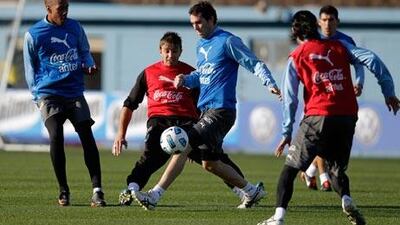 Uruguay’s players train for tonight’s final where they will face neighbours Paraguay.
