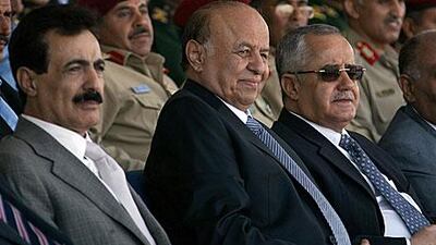 Abdrabuh Mansur Hadi, centre, attends a graduation ceremony for police cadets in Sanaa this October.