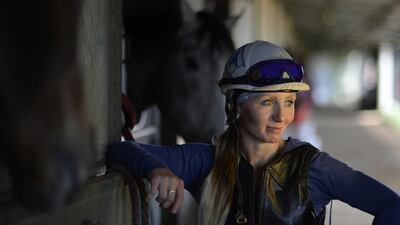 Jockey Kelsi Purcell, at the stables in Arapahoe Park in Aurora, has come back to racing after suffering a broken vertebra. RJ Sangosti / Getty Images